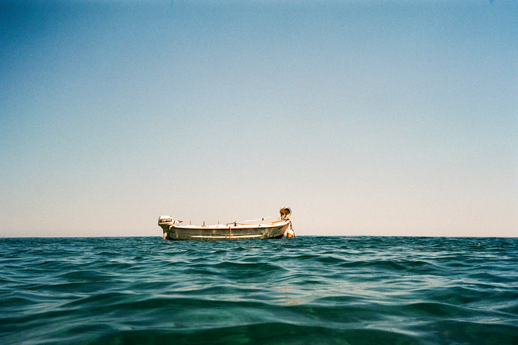 A lone boat in the sea.